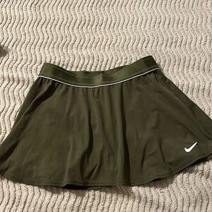 Olive color. May be worn for tennis or pickleball.